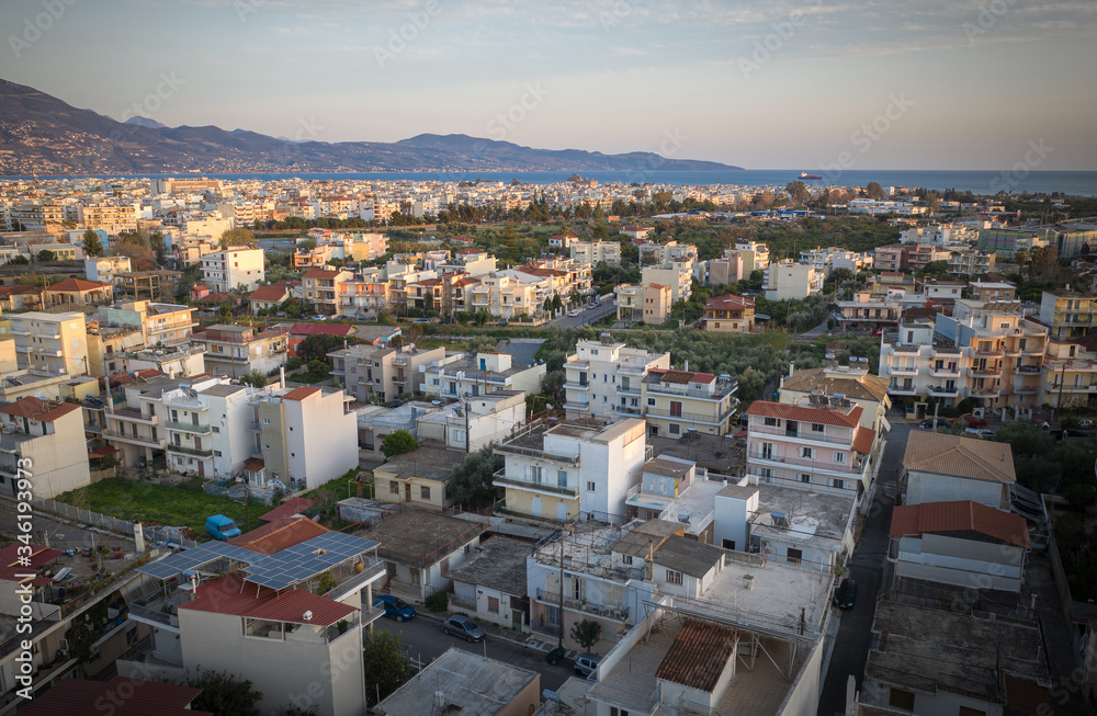 Aerial view of the wonderful old town of Kalamata City and the historical Castle at Sunset. Kalamata has become a top tourist attraction located in Messinia, Peloponnese, Greece.