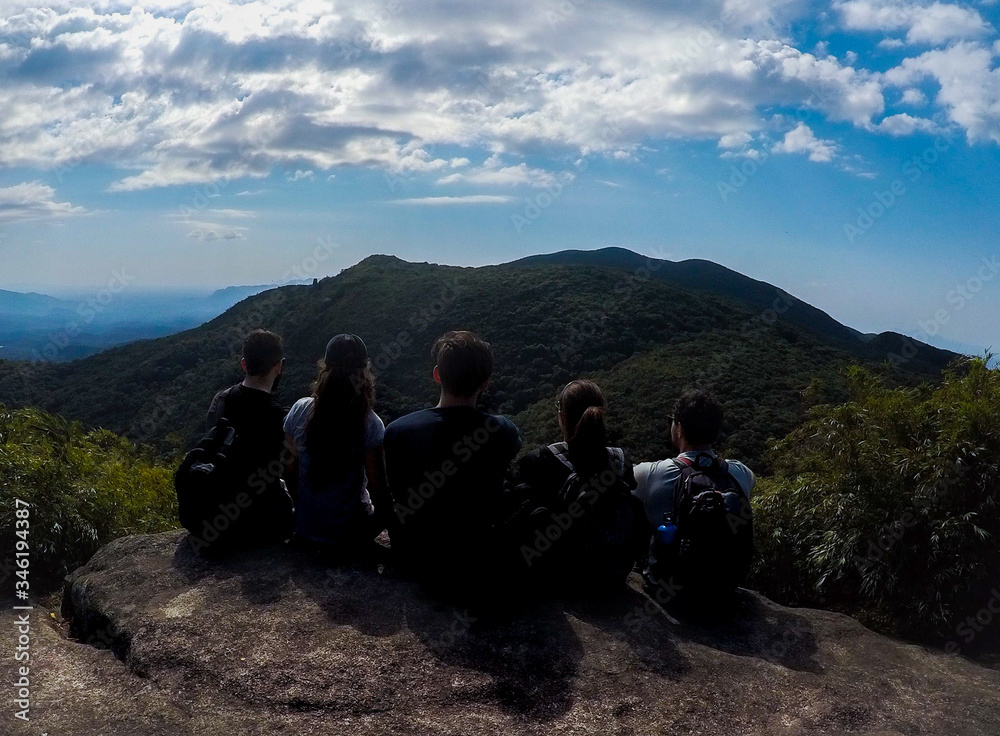 Fototapeta premium Five friends watching the mountains 