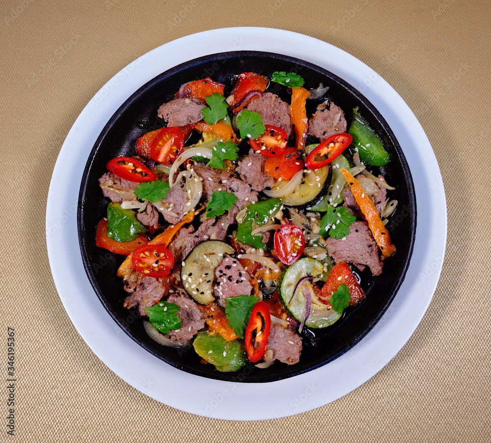 Greek eggplant with veal on a blue Greek eggplant with veal on a blue