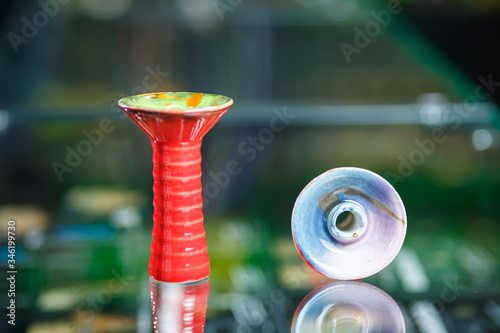 multi-colored bowls for smoking tobacco and hookah photo