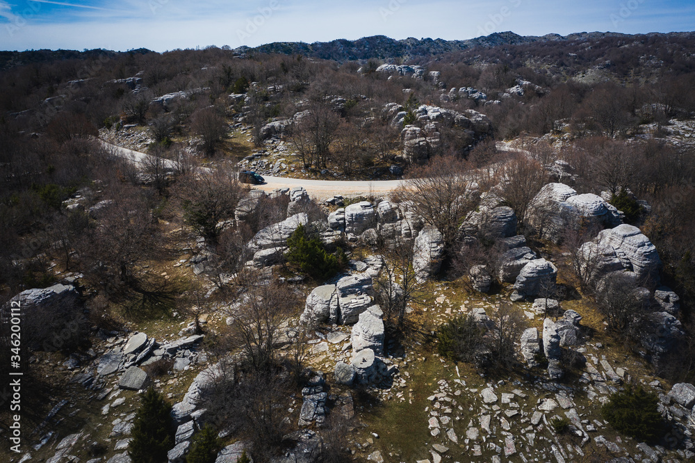 Stone forest, famous natural sightseeing (located between Monodendri village and Oxia viewpoint at Zagorochoria, Epirus, Greece) at winter. Natural geological formation.