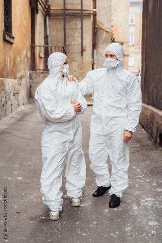 Doctors in tight, well-protected clothes that do not allow radiation to get, ready to deal with the consequences of the accident. Save the world at the cost of their lives © Daria