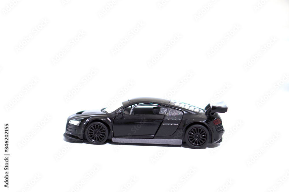 Realistic model of a black car. Beautiful toy, an elite model.