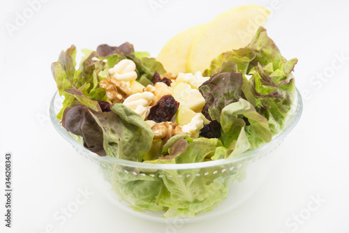 Waldorf salad apple, nuts raisins, lettuce and mayonnaise photo