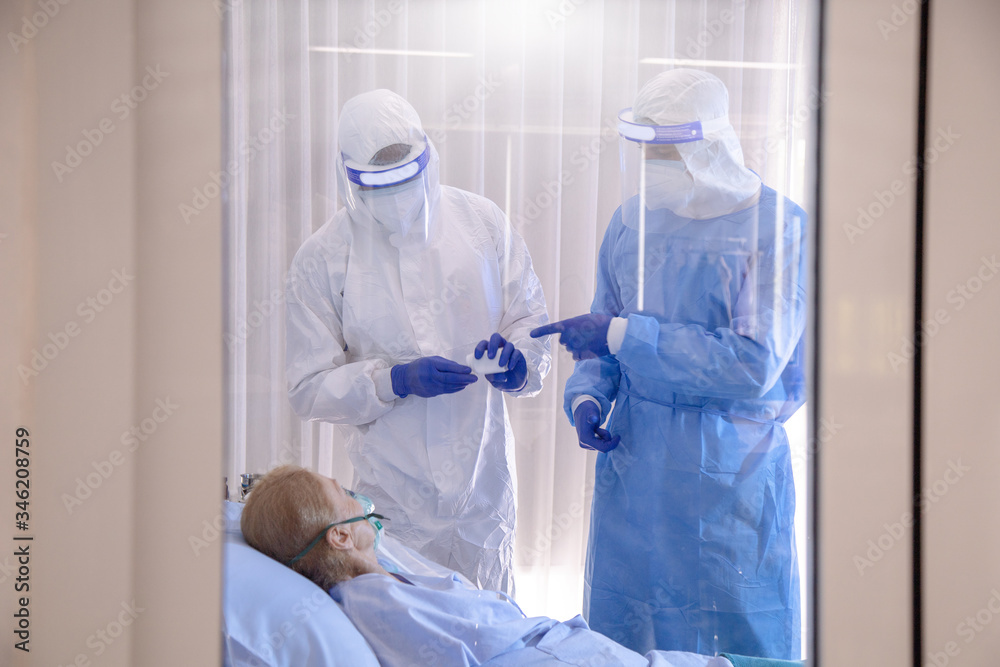 Hopeless mood on Infected covid19 patient during lying on bed at quarantine room area in hospital. Case from coronavirus covid 19 disease. Corona virus is world global social issue concept.