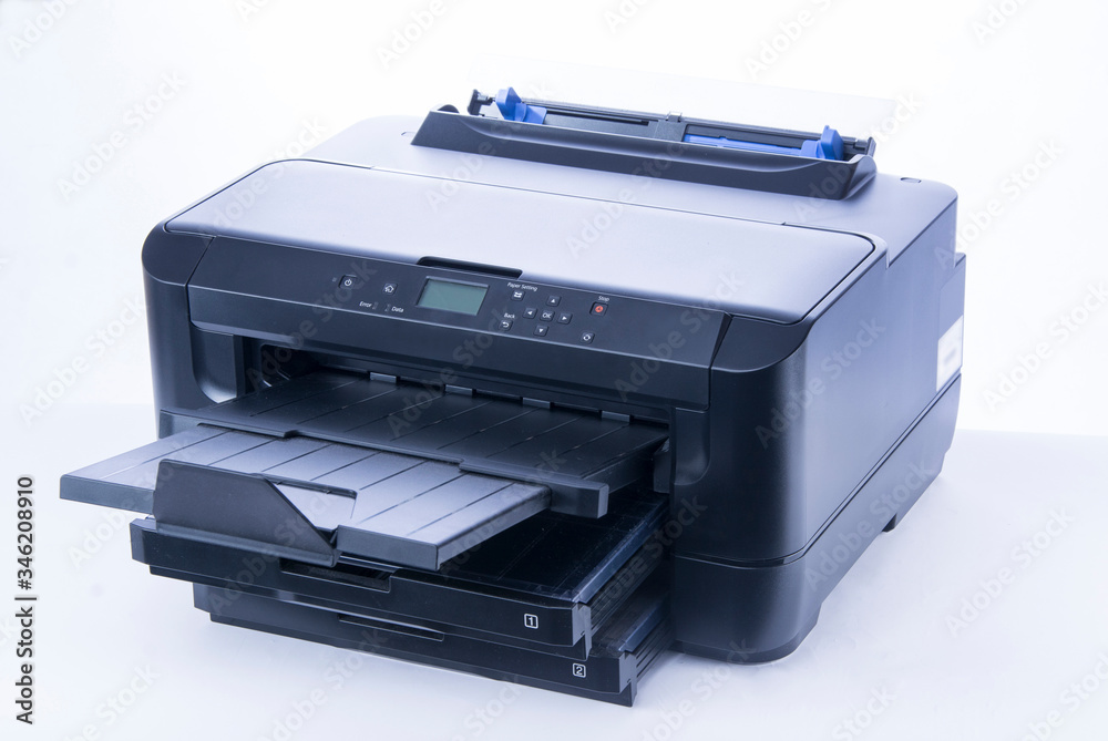 Multifunction SRA3 inkjet printer on white background. Office printer. Multifunction SRA3 inkjet printer on white background. Office printer.