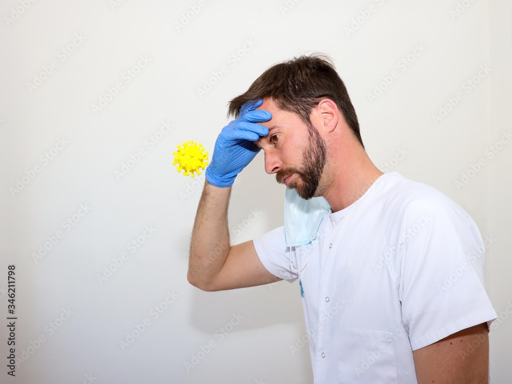 Doctor concerned about virus and thinking what to do. Doctor concerned about virus and thinking what to do.