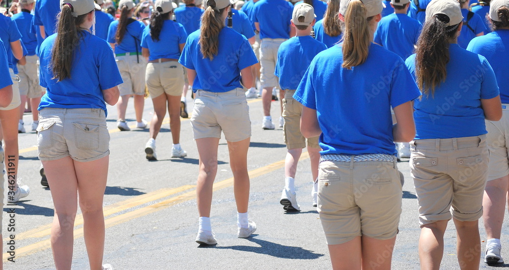 Obraz premium Marching band in a parade outdoors.