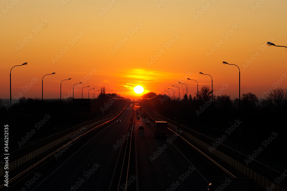 dawn and sunset on the road, transport at dawn, cars go to sunset dawn and sunset on the road, transport at dawn, cars go to sunset