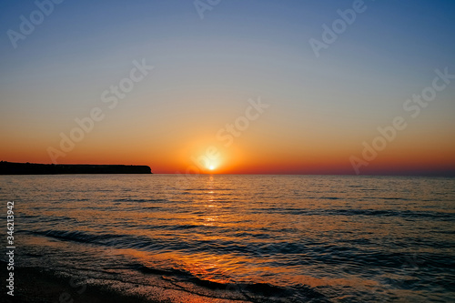 A bright warm beautiful sunset on the seashore