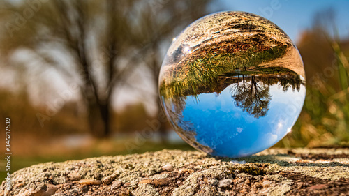 Crystal ball landscape shot near the famous Bogenberg, Bavaria, Germany photo