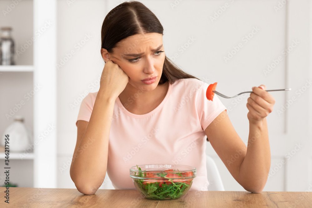 Sad Girl Eating Vegetable Salad Losing Weight At Home