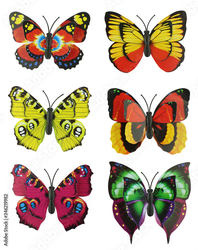 Scrapbook set of six multi-colored bright artificial butterflies isolated on a white background