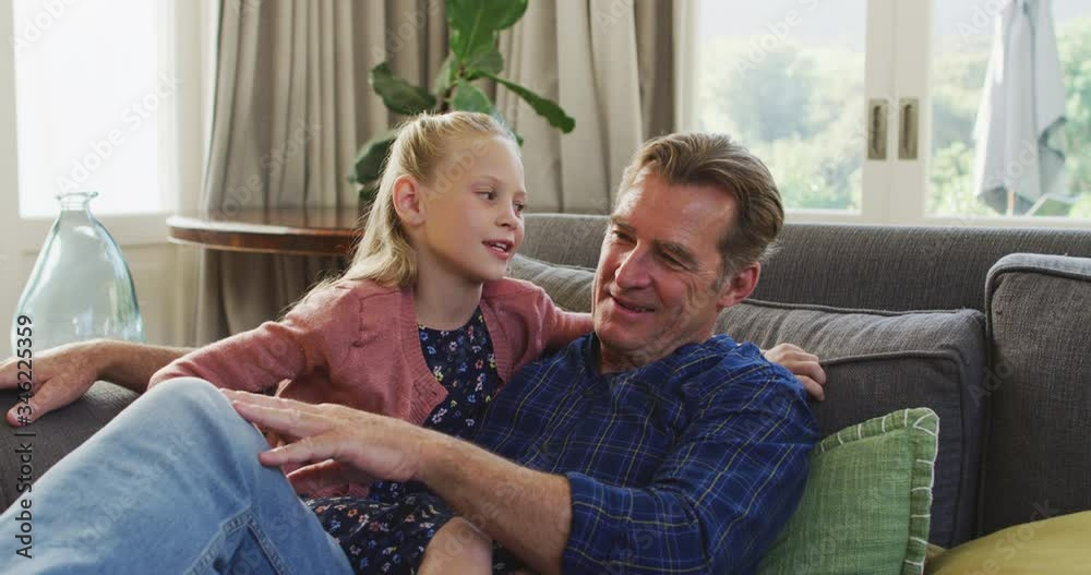 Grandfather and granddaughter spending time together Grandfather and granddaughter spending time together