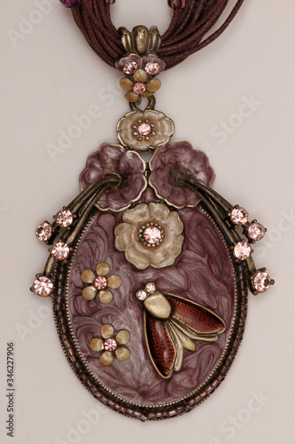 Necklace made as a hobby with hand workmanship. Jewelry used by women, necklace. A necklace that looks aged by hand work.