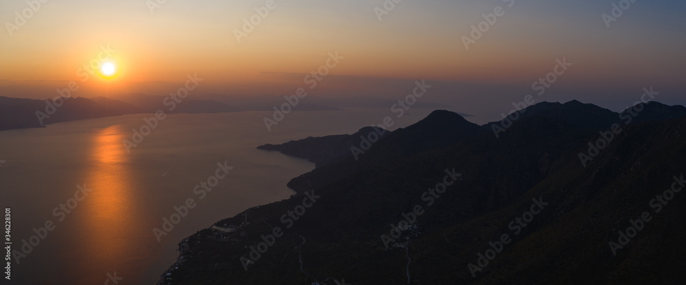 Orange sunset wide panorama at Greece, Lakonia