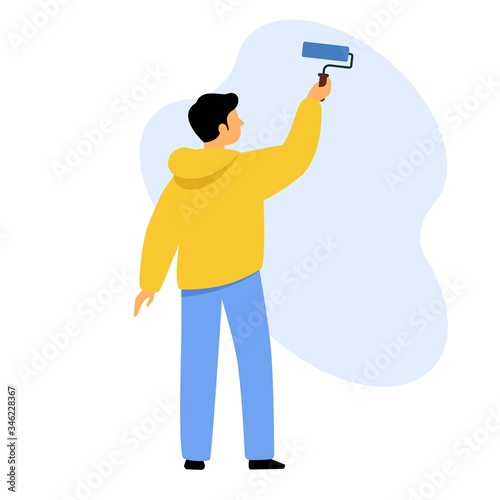 A man paints a wall with paint. The guy makes repairs in the room.