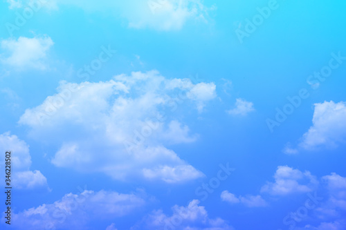 beauty soft light blue and violet with fluffy clouds on sky. multi color rainbow image. abstract fantasy growing sweet view.