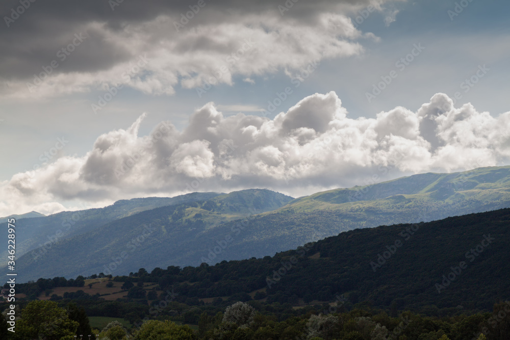 Obraz premium Mount Jura Alps in France, Ain before the rain. Mountains in the fog.