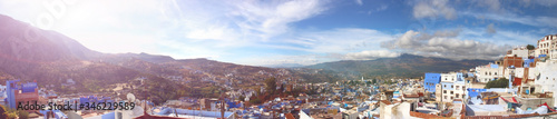 Panoramic view from the rooftop on Chefchaouen town, Morocco. Medina of the Blue city on sunset.