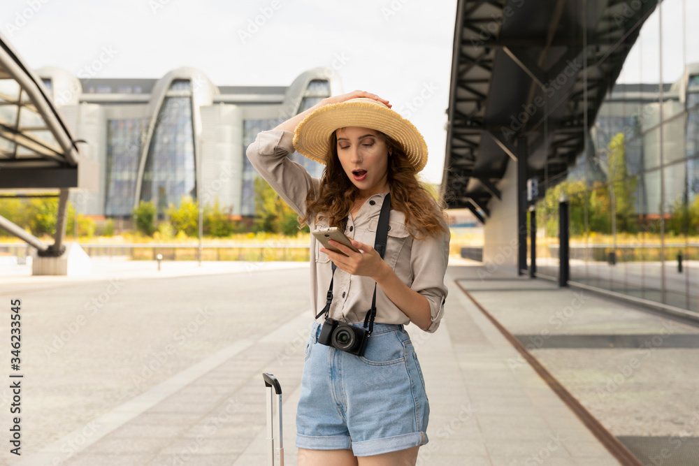 Image of excited young pretty woman tourist posing.