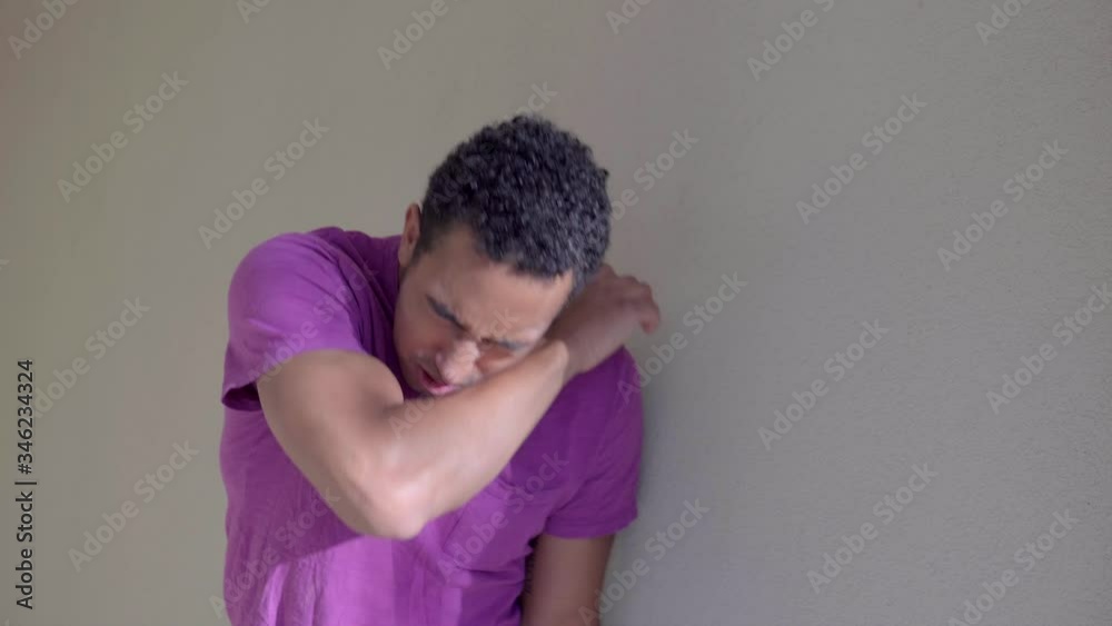Young Man Coughing & Sneezing, having a hard time breathing. Young Man Coughing & Sneezing, having a hard time breathing.