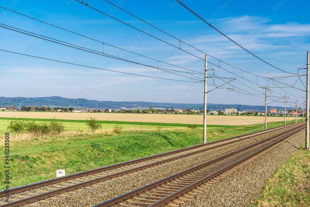 Railroad tracks in the beautiful green landscape Railroad tracks in the beautiful green landscape