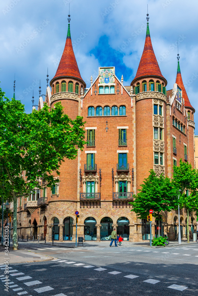 Street with beautiful building in Barcelona, Catalonia, Spain. Architecture and landmark of Barcelona.