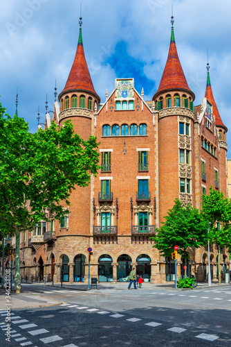Street with beautiful building in Barcelona, Catalonia, Spain. Architecture and landmark of Barcelona.