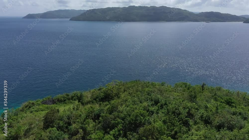 Over the hill into the sea in Romblon Over the hill into the sea in Romblon