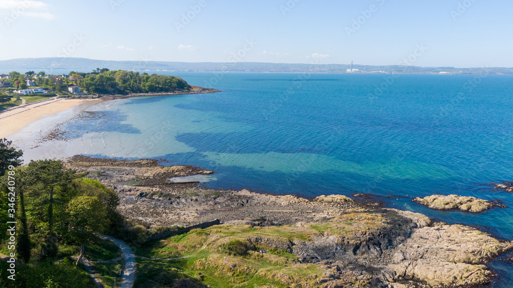 Aerial view of Coast of Irish Sea in Helen's Bay, Northern Ireland. View from above on beach in sunny day Aerial view of Coast of Irish Sea in Helen's Bay, Northern Ireland. View from above on beach in sunny day
