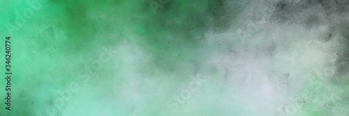 beautiful dark sea green, sea green and light gray colored vintage abstract painted background with space for text or image. can be used as horizontal background graphic