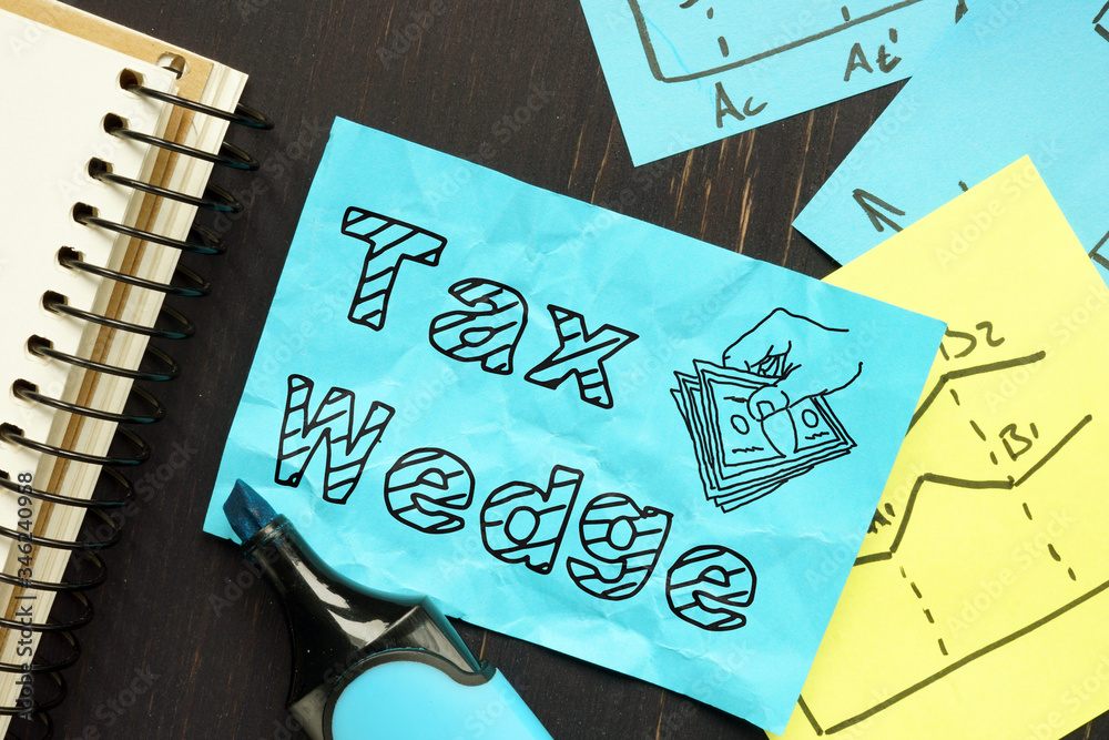 Fototapeta premium Tax Wedge is shown on the conceptual business photo