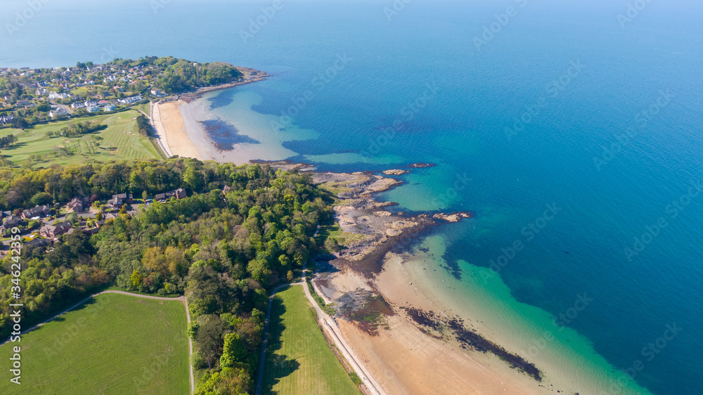 Aerial view of Coast of Irish Sea in Helen's Bay, Northern Ireland. View from above on beach in sunny day