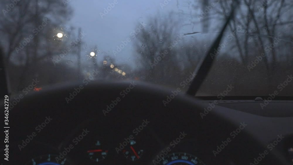 Inside View Of A Car Driving On The Street In Canada During Rainy Day - Close Up Shot Inside View Of A Car Driving On The Street In Canada During Rainy Day - Close Up Shot