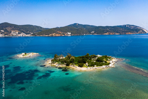 Fototapeta Naklejka Na Ścianę i Meble -  Small island in Aegean sea, Poros, Greece