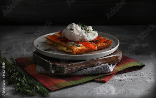 Obraz na płótnie Belgian waffle with salmon and porched egg w salonie