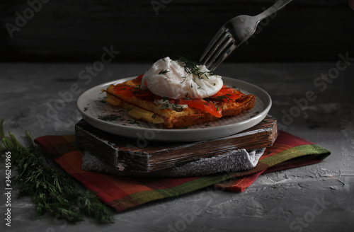 Obraz na płótnie Belgian waffle with salmon and porched egg w salonie