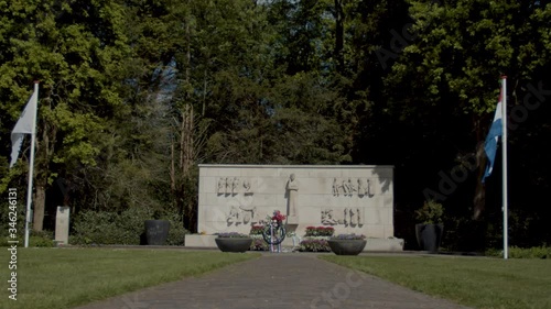 Dutch World War II monument during liberation day - slow slider out - medium photo