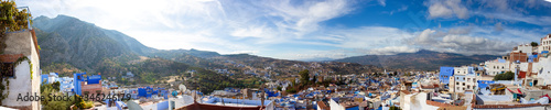 Panoramic view to Chefchaouen town, Morocco. Famous brightly blue painted medina (old town). Idyllic background with Rif mountains and Blue City in the North of Morocco, Africa. © Вера Тихонова