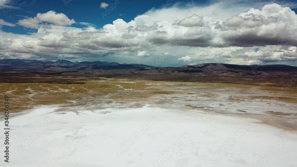 Cinematic Aerial View of Salt Flat in Valley Under Volcanic Hills. Salinas Grandes, Salta, Argentina Cinematic Aerial View of Salt Flat in Valley Under Volcanic Hills. Salinas Grandes, Salta, Argentina