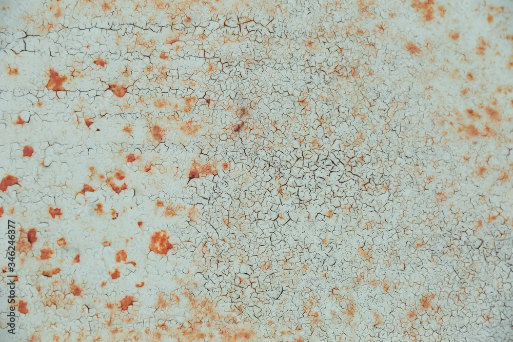 backdrop with rust on metal. gray paint with cracks on rusty metal backdrop with rust on metal. gray paint with cracks on rusty metal