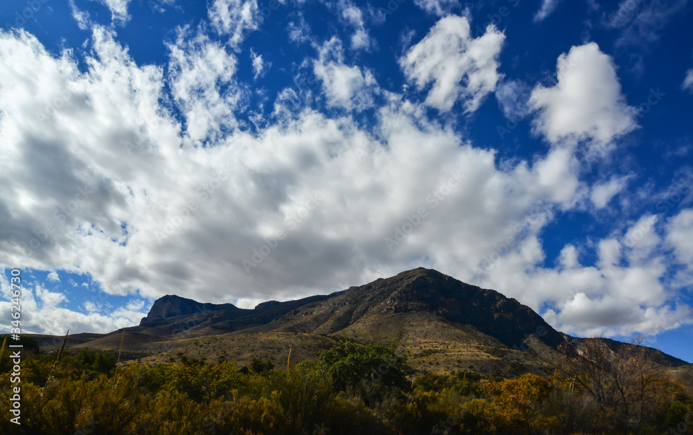 Big cumulus clouds in a mountain landscape in New Mexico Big cumulus clouds in a mountain landscape in New Mexico