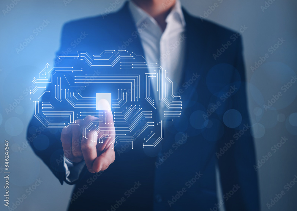Brain with PCB design and businessman pointing brain microchip ...