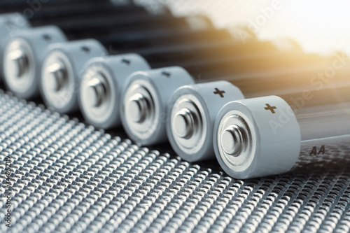 Closeup of many AA color steel batteries photo