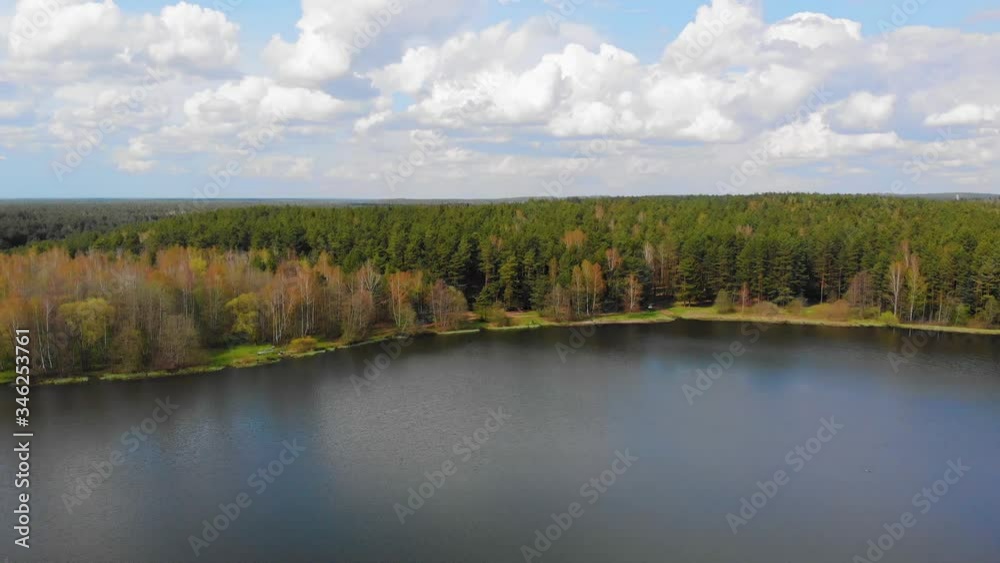 Flying above the lake and forest. Drone aerial footage Flying above the lake and forest. Drone aerial footage