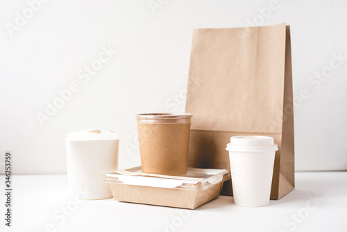 Various packaging for food delivery on white background.