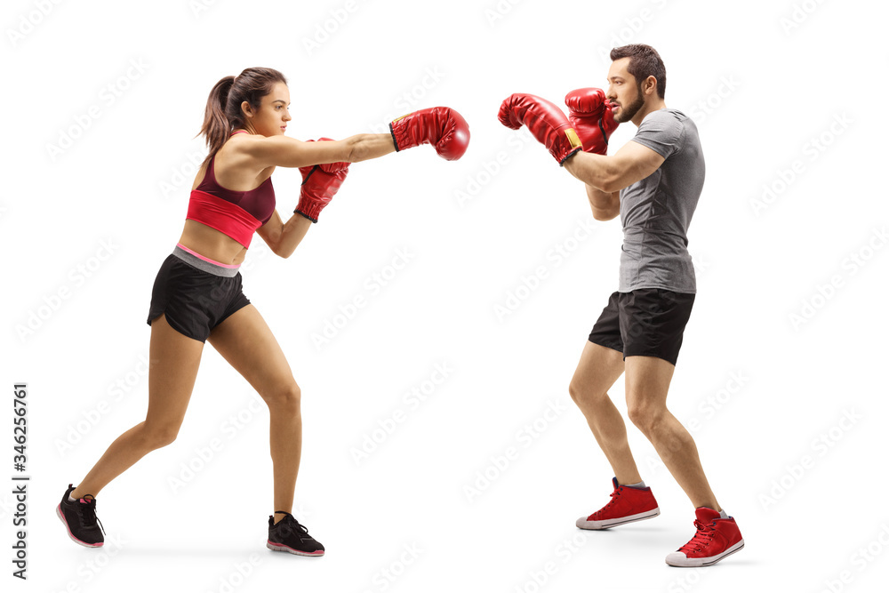 Man and woman practicing boxing