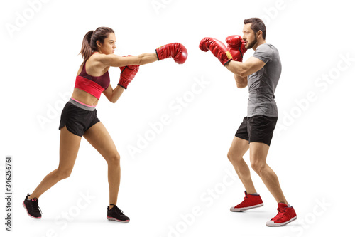 Man and woman practicing boxing