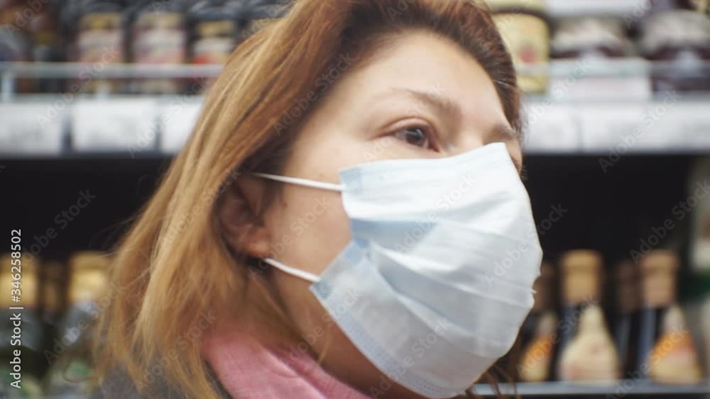 Woman in a store during a pandemic.